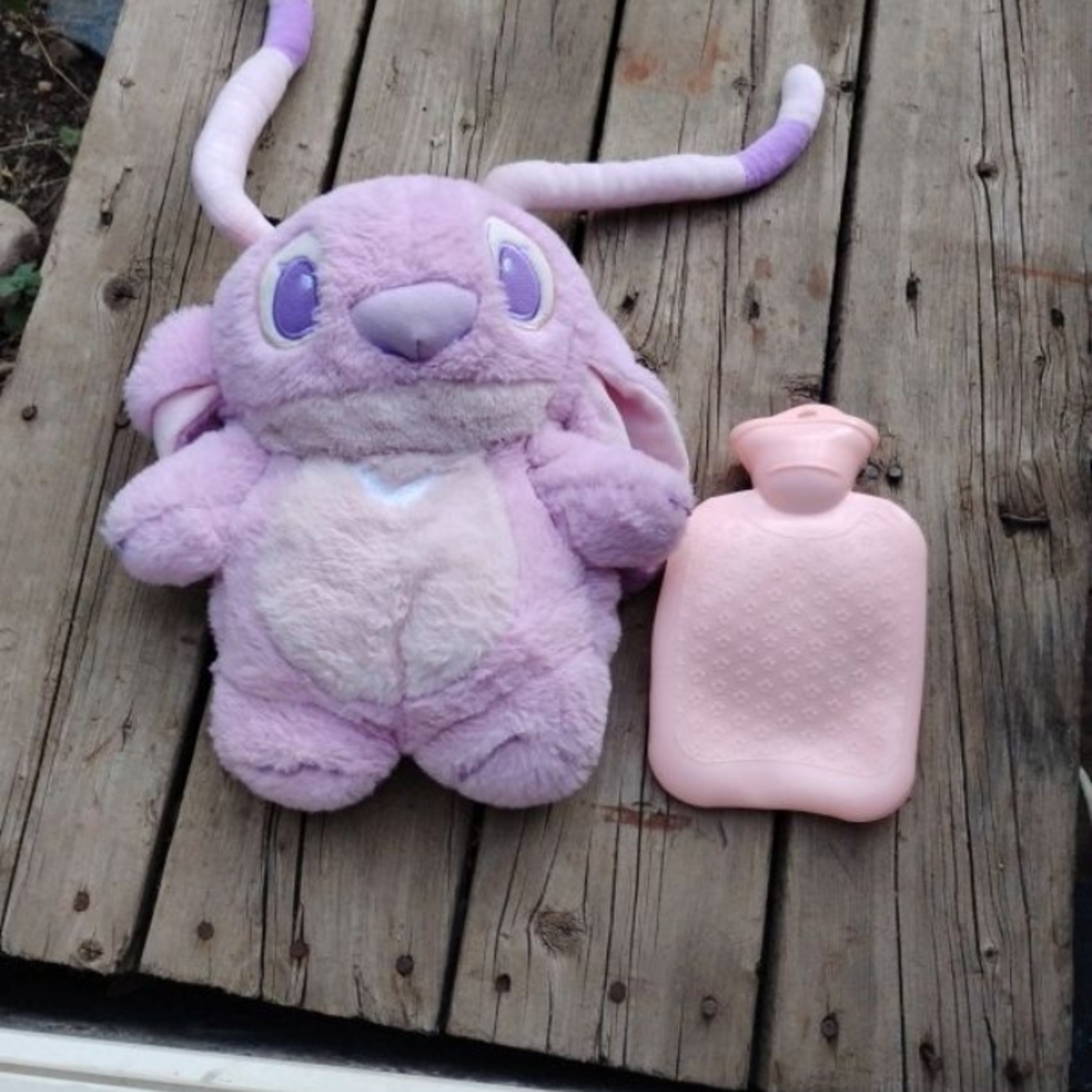 Purple Plush Toy and Pink Heat Pad
